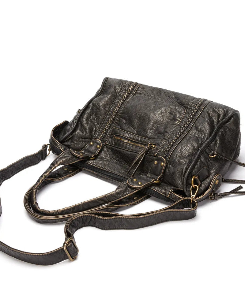 Victoria Lumina chic black PU leather handbag with multiple pockets, featuring stylish design and functional storage.