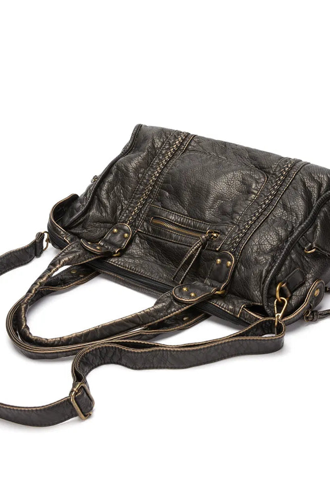 Victoria black PU leather handbag by Lumina Wear featuring multiple pockets and stylish design, shown with top handles and zip closure.
