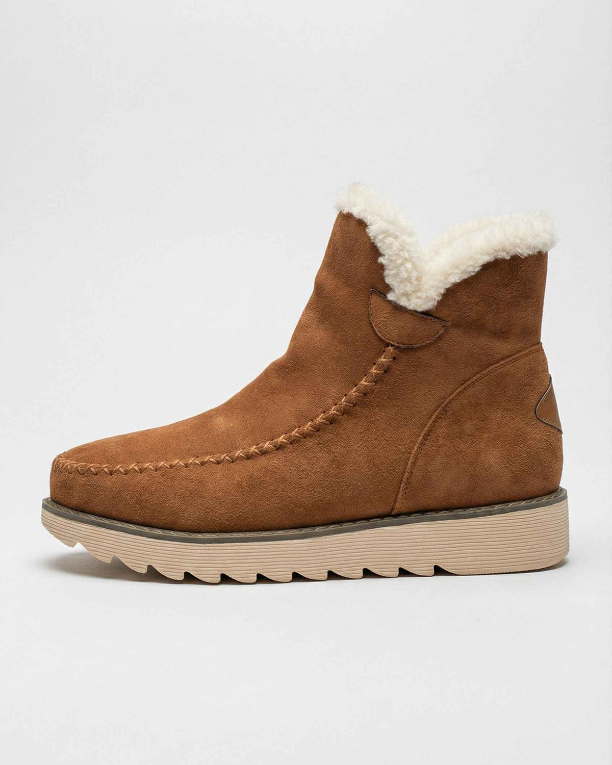 Lumina Wear Victoria chic brown ankle boots with warm lining, stylish footwear for cold weather, featuring a sleek ankle-high design.