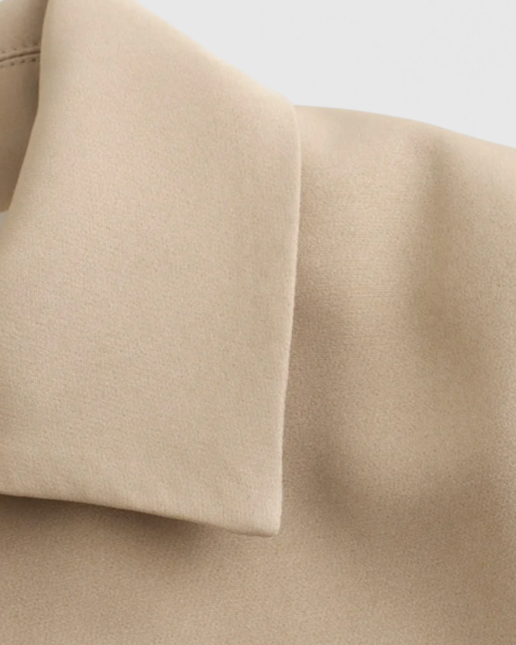 Khaki Victoria Lumina Wear cropped button jacket with flattering fit, stylish design, and tailored silhouette.