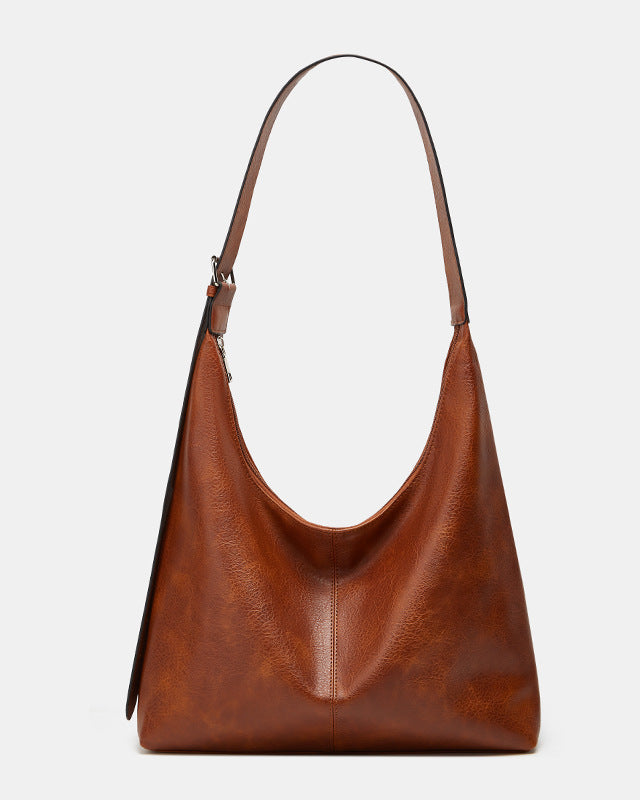 Brown Lumina Wear Victoria commuter tote handbag with ample storage, durable design, and chic style for everyday use.