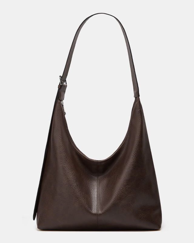 Lumina Wear Victoria commuter tote handbag in brown with spacious interior and durable design for everyday use.