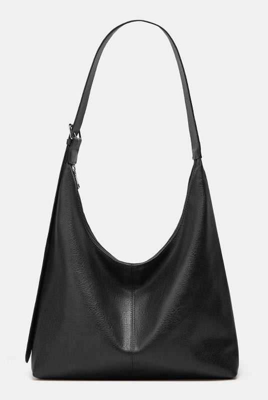 Lumina Wear Victoria commuter tote bag in brown, featuring durable construction and spacious interior for everyday use.
