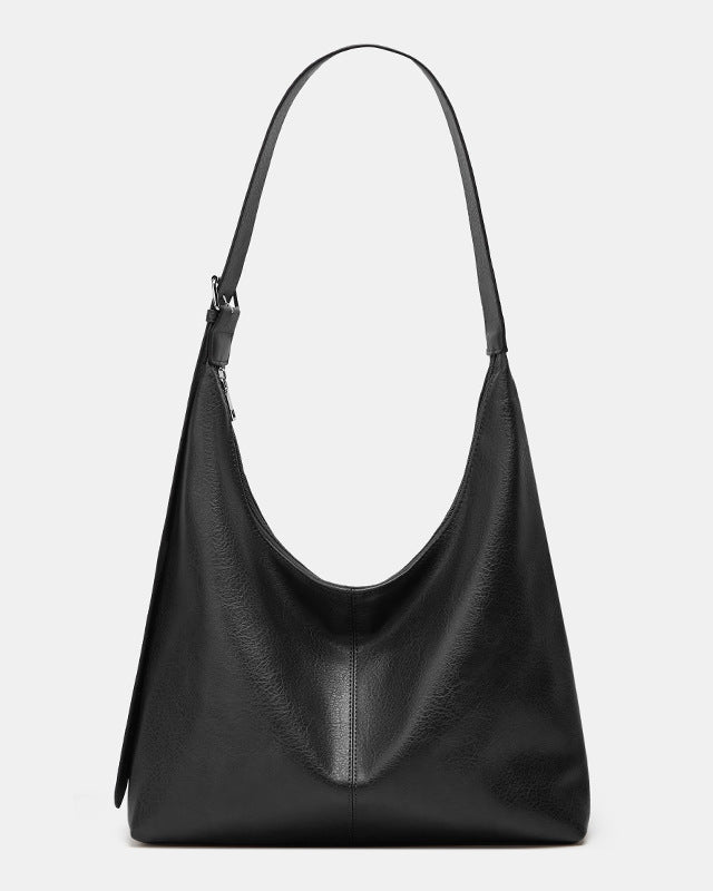 Brown Lumina Wear Victoria commuter tote handbag with durable design and ample storage for daily use.