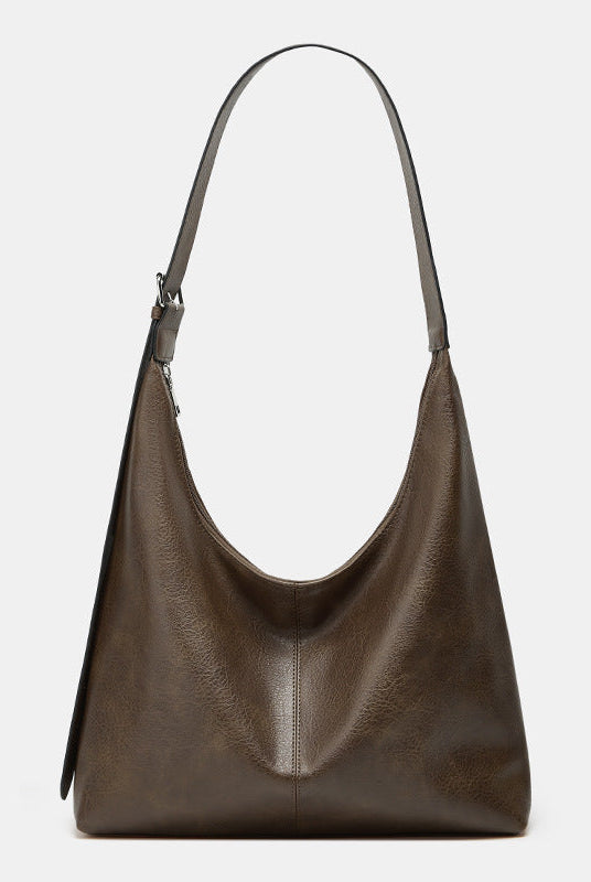 Victoria Lumina commuter tote bag in brown with durable design and ample storage, perfect for daily use and stylish travel.