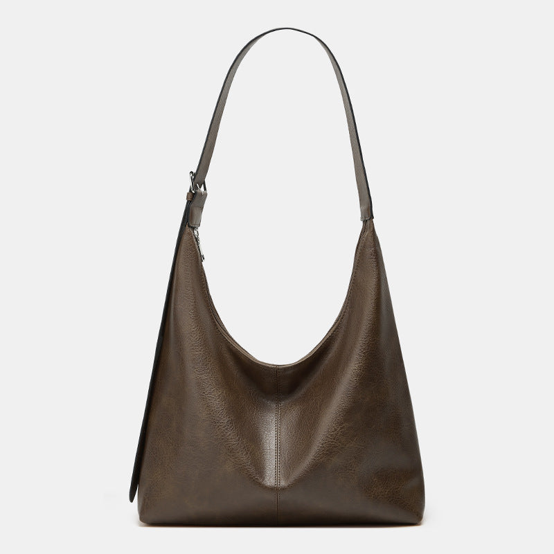 Victoria Lumina commuter tote bag in brown with durable design and ample storage, perfect for daily use and stylish travel.