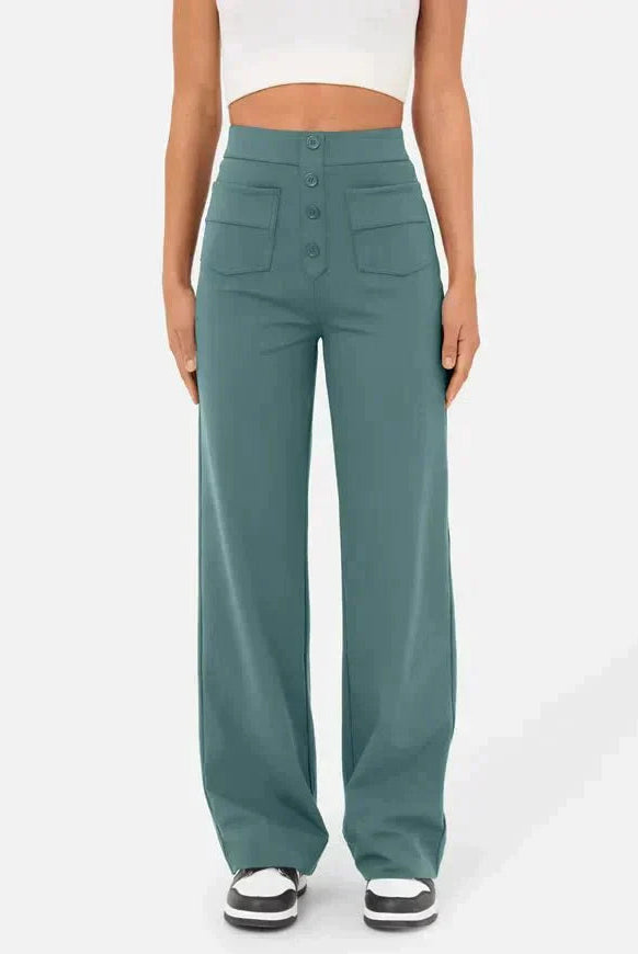 Victoria high-waisted trousers by Lumina Wear in stone green with stretch fabric, styled for a chic, modern look.