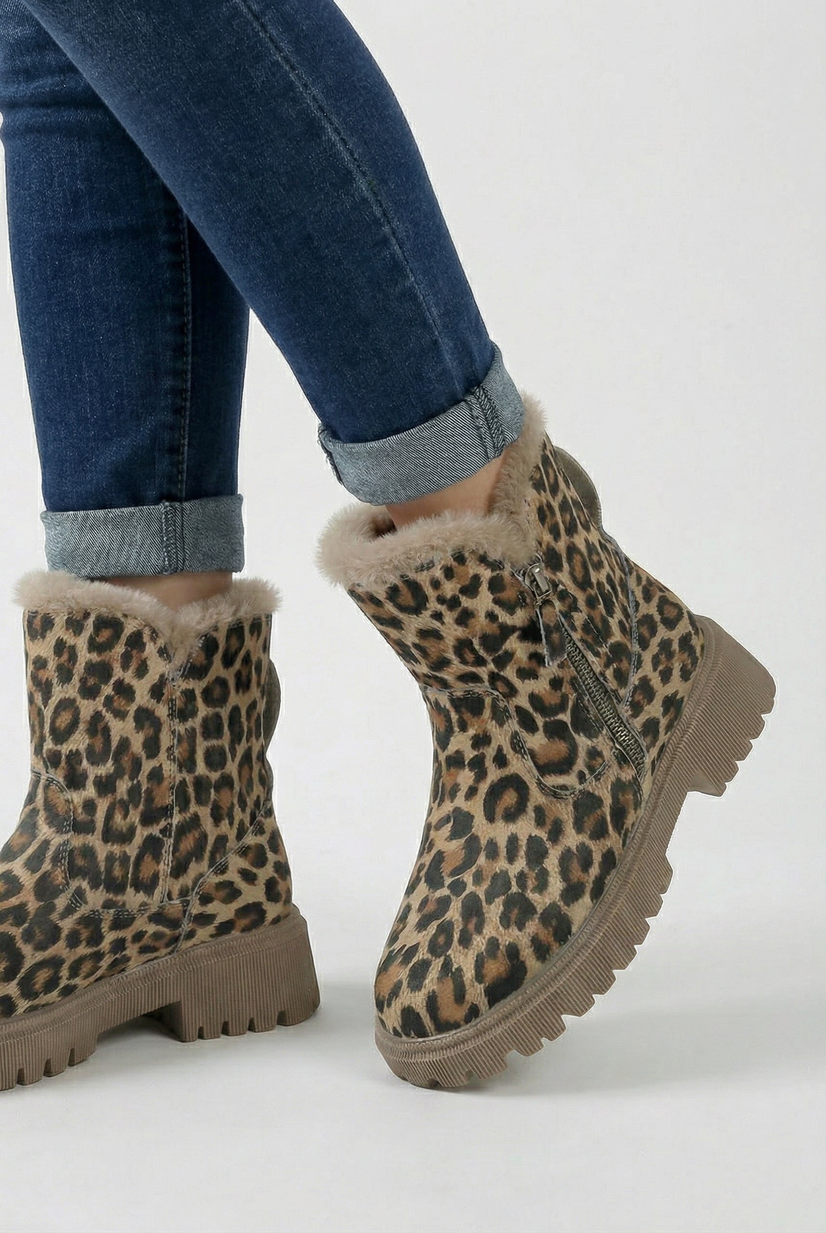 Lumina Wear Victoria leopard ankle boots with cozy lining, brown fur pattern, stylish ankle height, and sturdy sole.