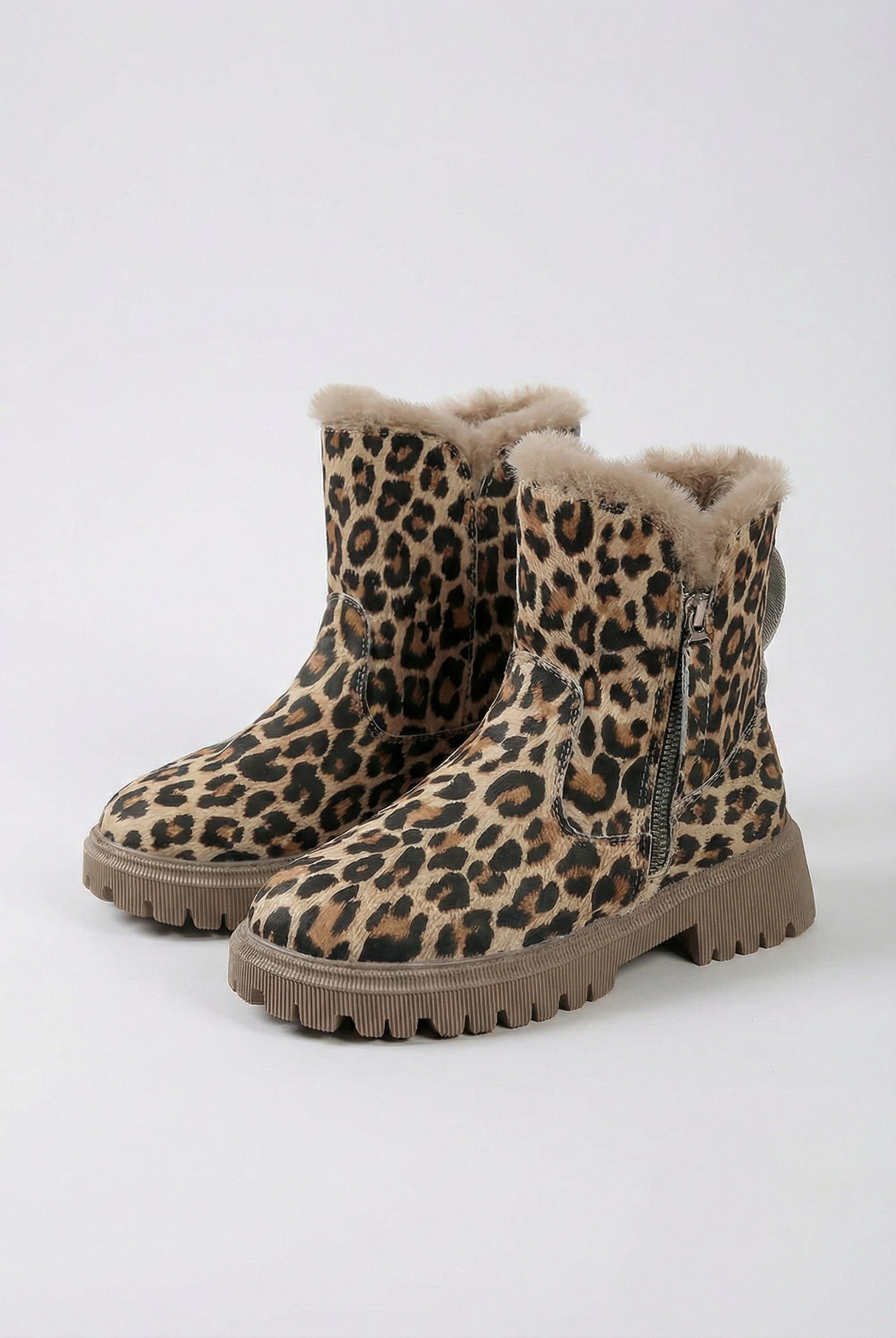 Lumina Wear Victoria Leopard Ankle Boots with cozy lining, brown leopard print, stylish design, and ankle height.