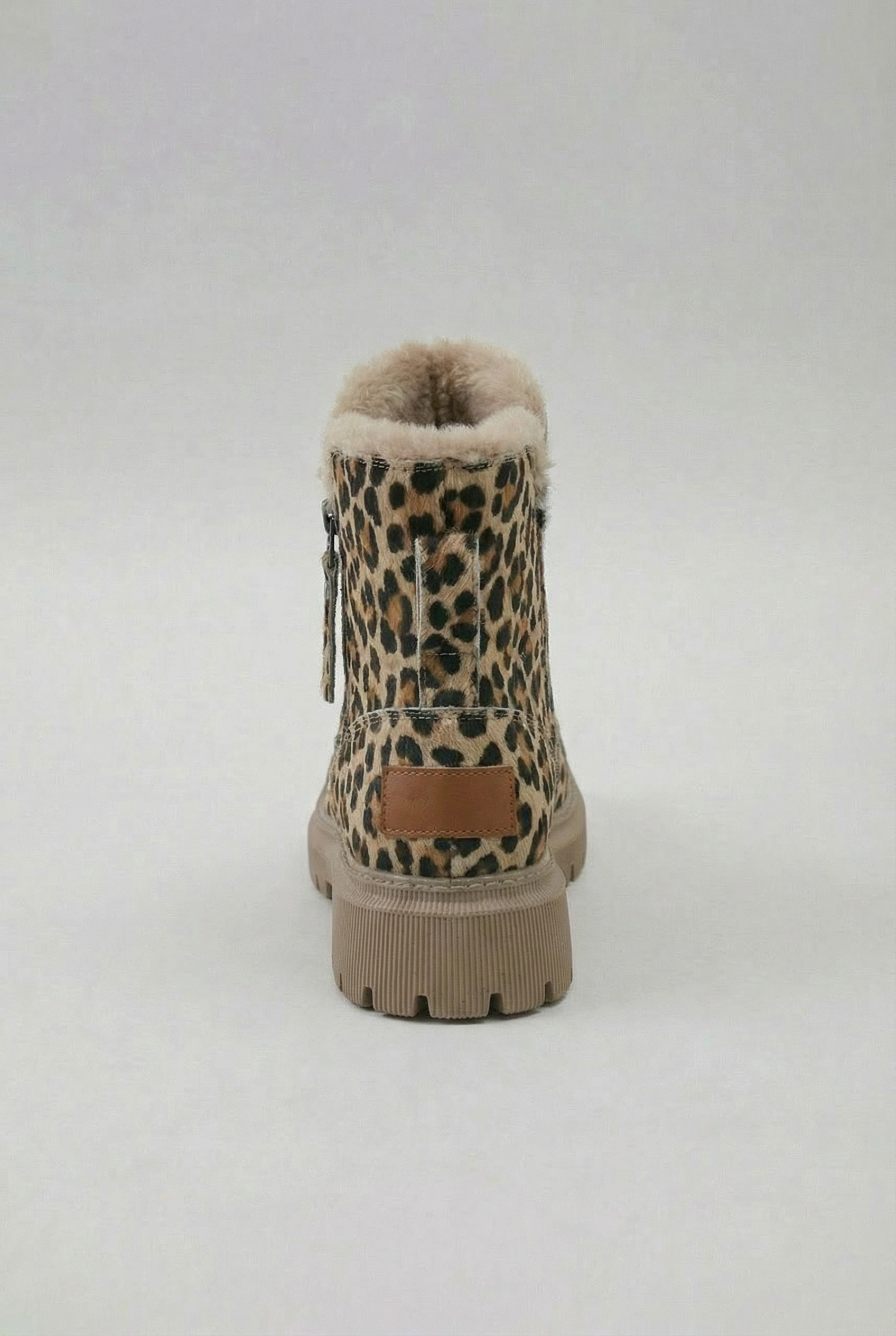 Lumina Wear Victoria leopard ankle boots with cozy lining, brown animal print, stylish ankle height, and comfortable design.