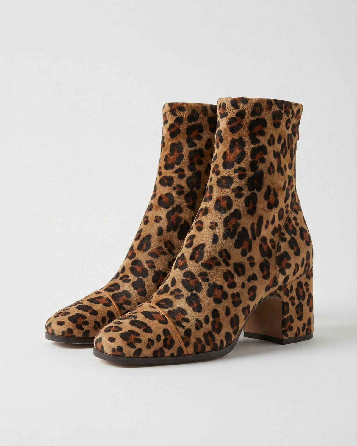 Victoria Lumina leopard print ankle boots with retro heel, stylish women's footwear featuring bold animal print and vintage-inspired design.