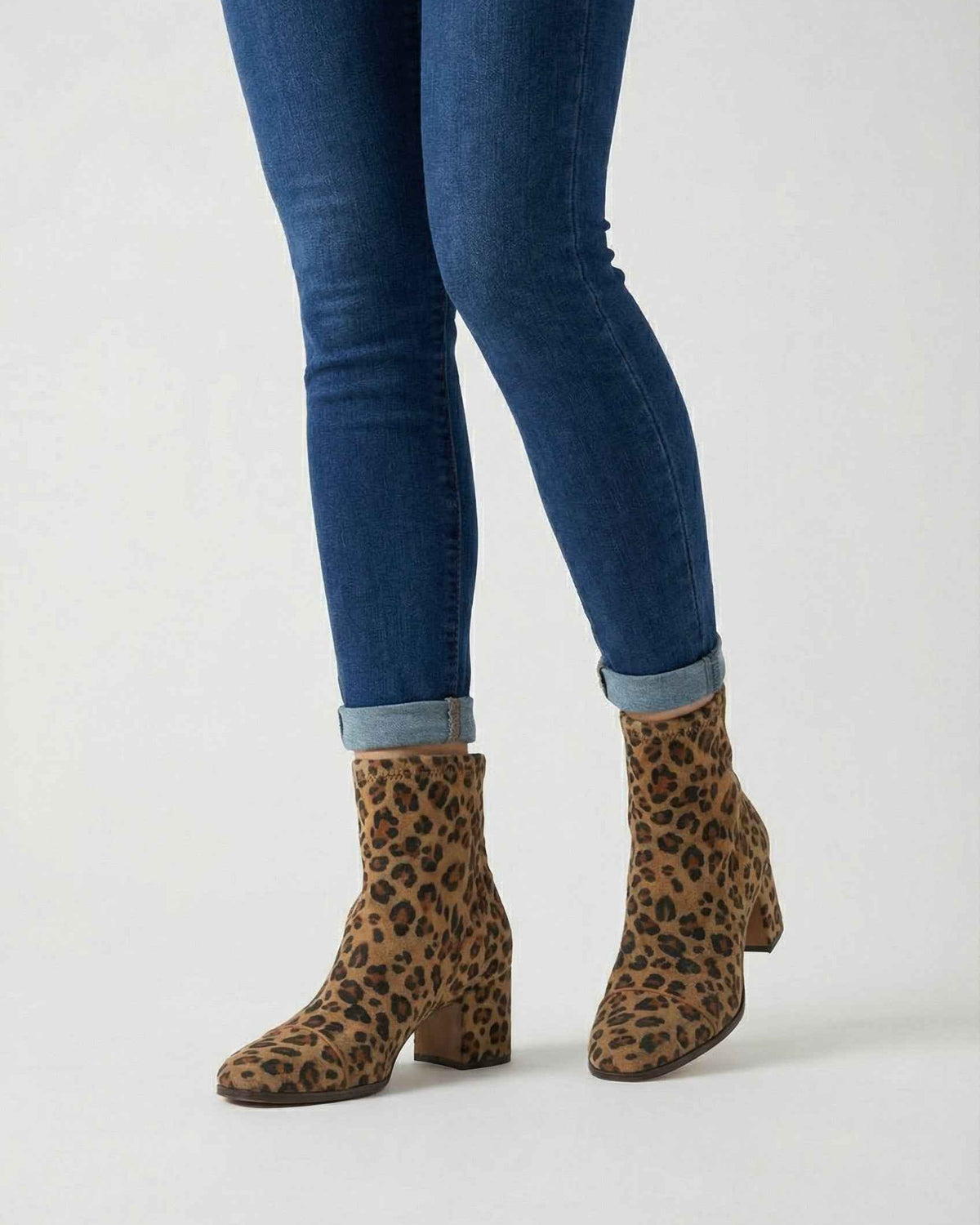 Victoria Lumina chic leopard print ankle boots with retro heel, showcasing stylish design and trendy pattern for women.