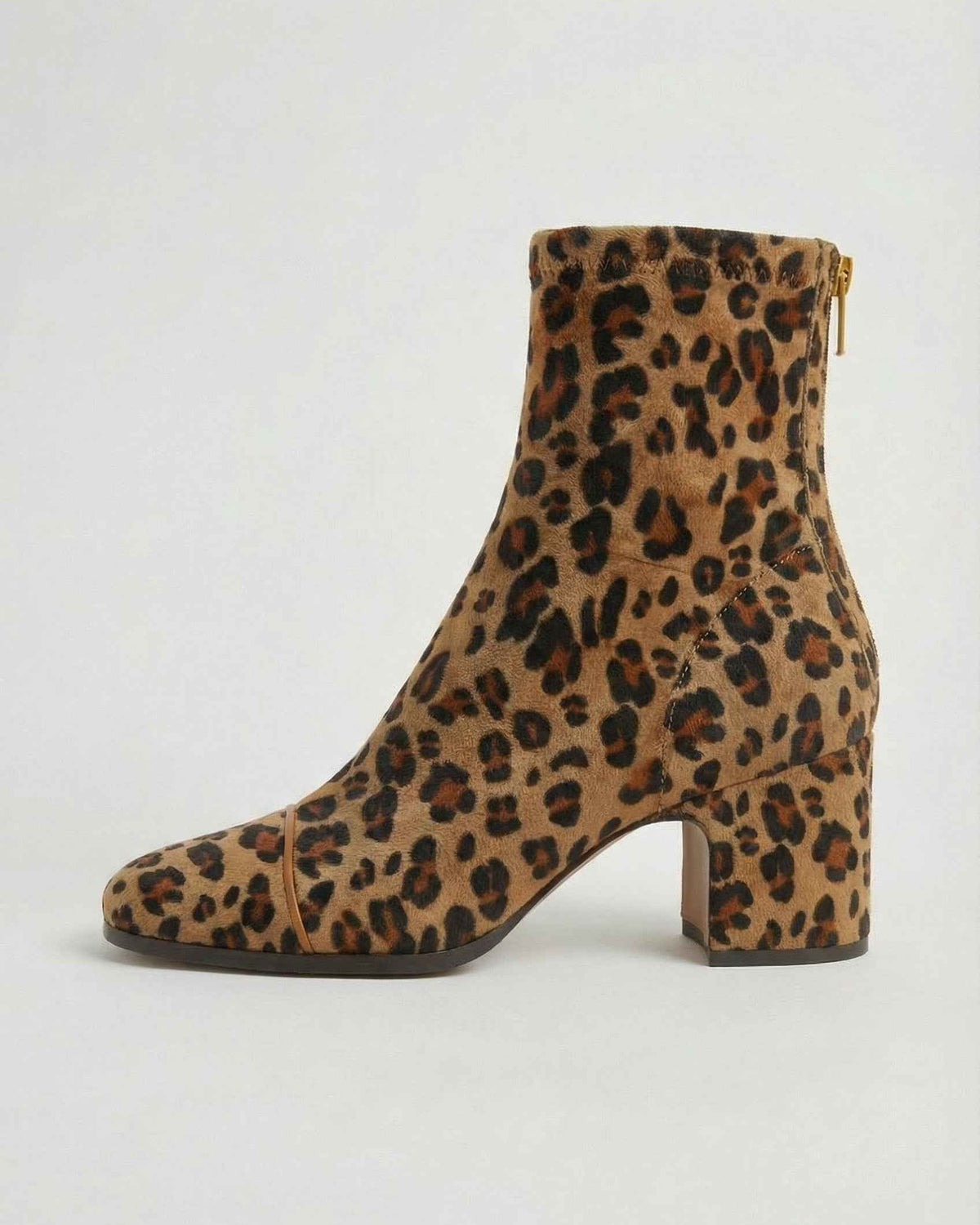Victoria Lumina leopard print ankle boots with retro heel, stylish women's footwear featuring bold animal print and vintage-inspired design.