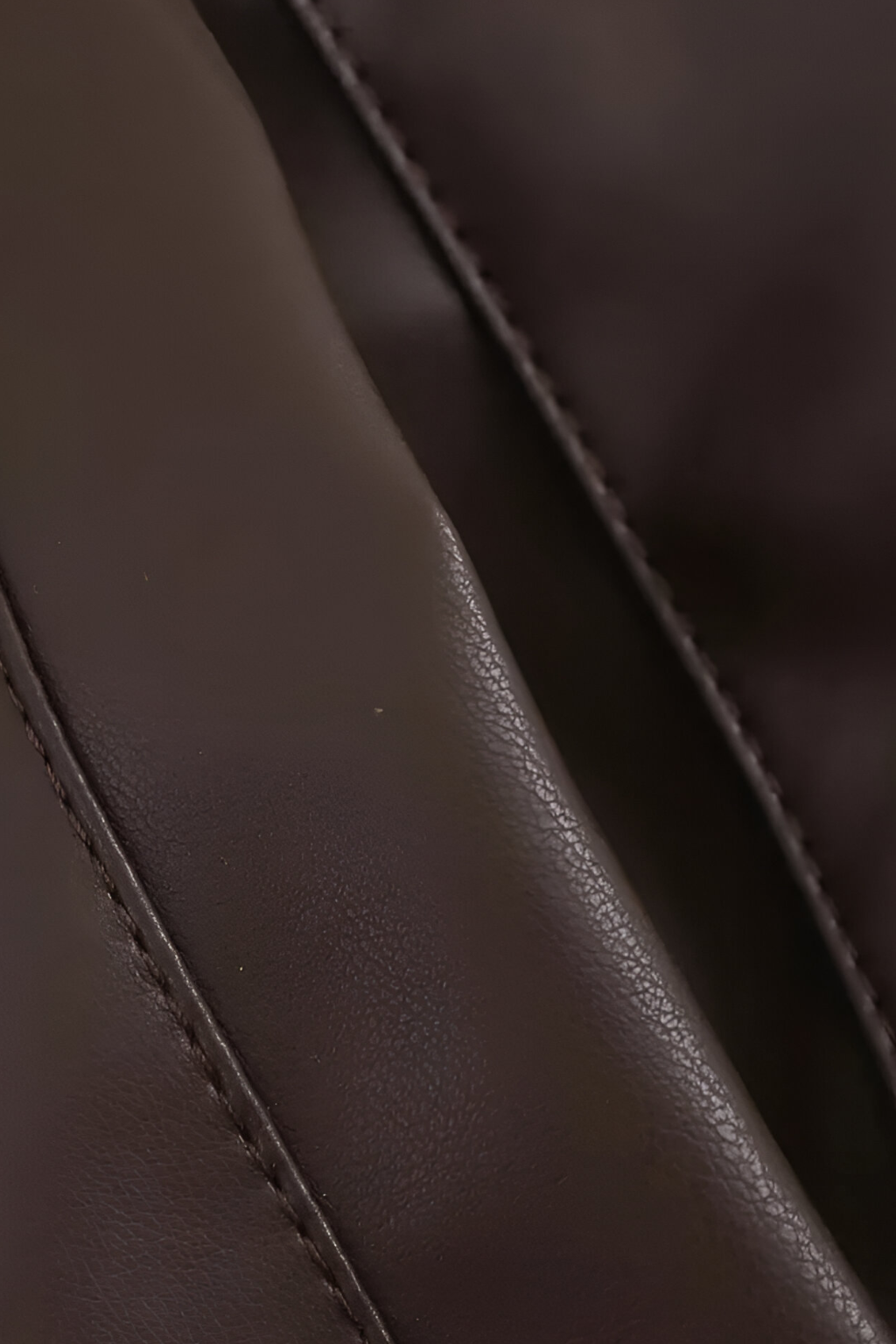 Brown loose fit aviator jacket for women by Lumina Wear, featuring a stylish design and comfortable fit.