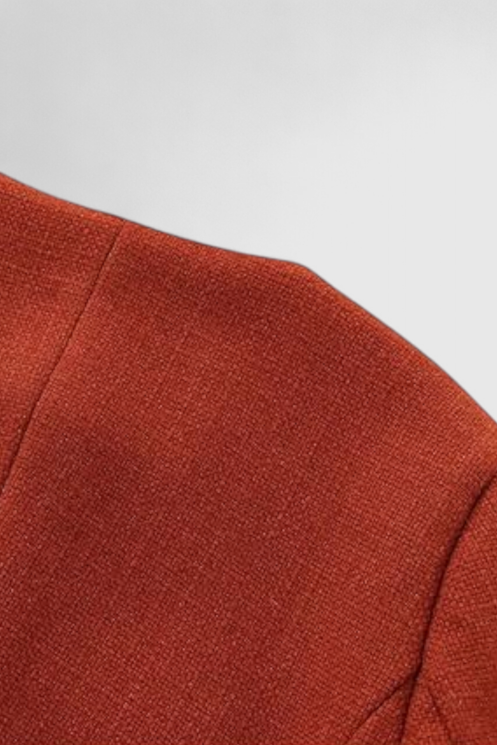 Victoria Lumina women's short jacket in vibrant orange-red with versatile style, featuring a chic, fashionable fit.