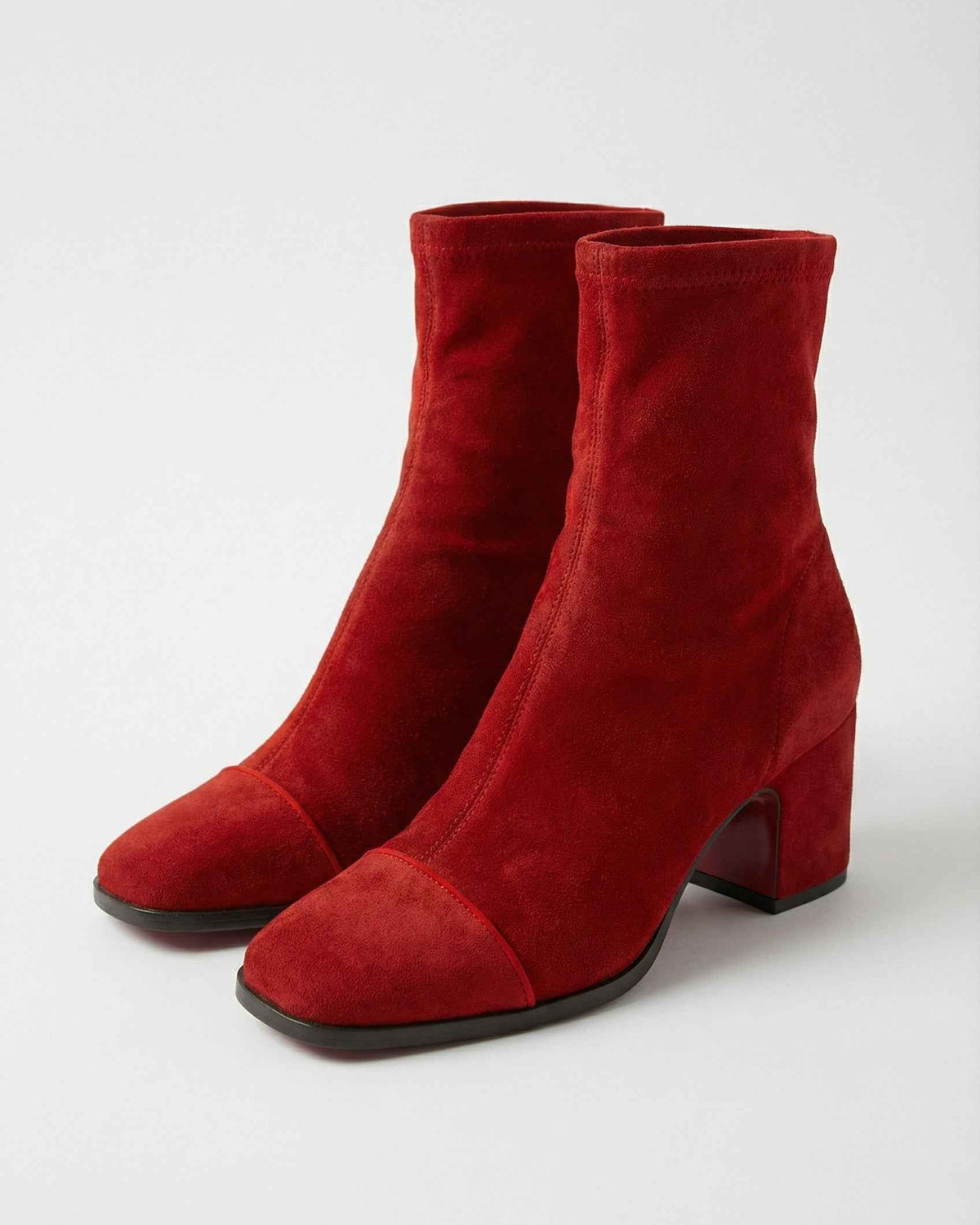 Red Victoria Lumina Wear mid-calf boots for women with chic retro style and statement heel, showcasing stylish leather design.