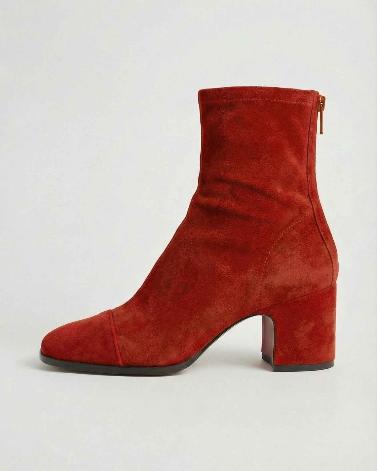 Victoria Lumina wear mid-calf boots for women with a chic retro style and statement heel, in vibrant red leather.