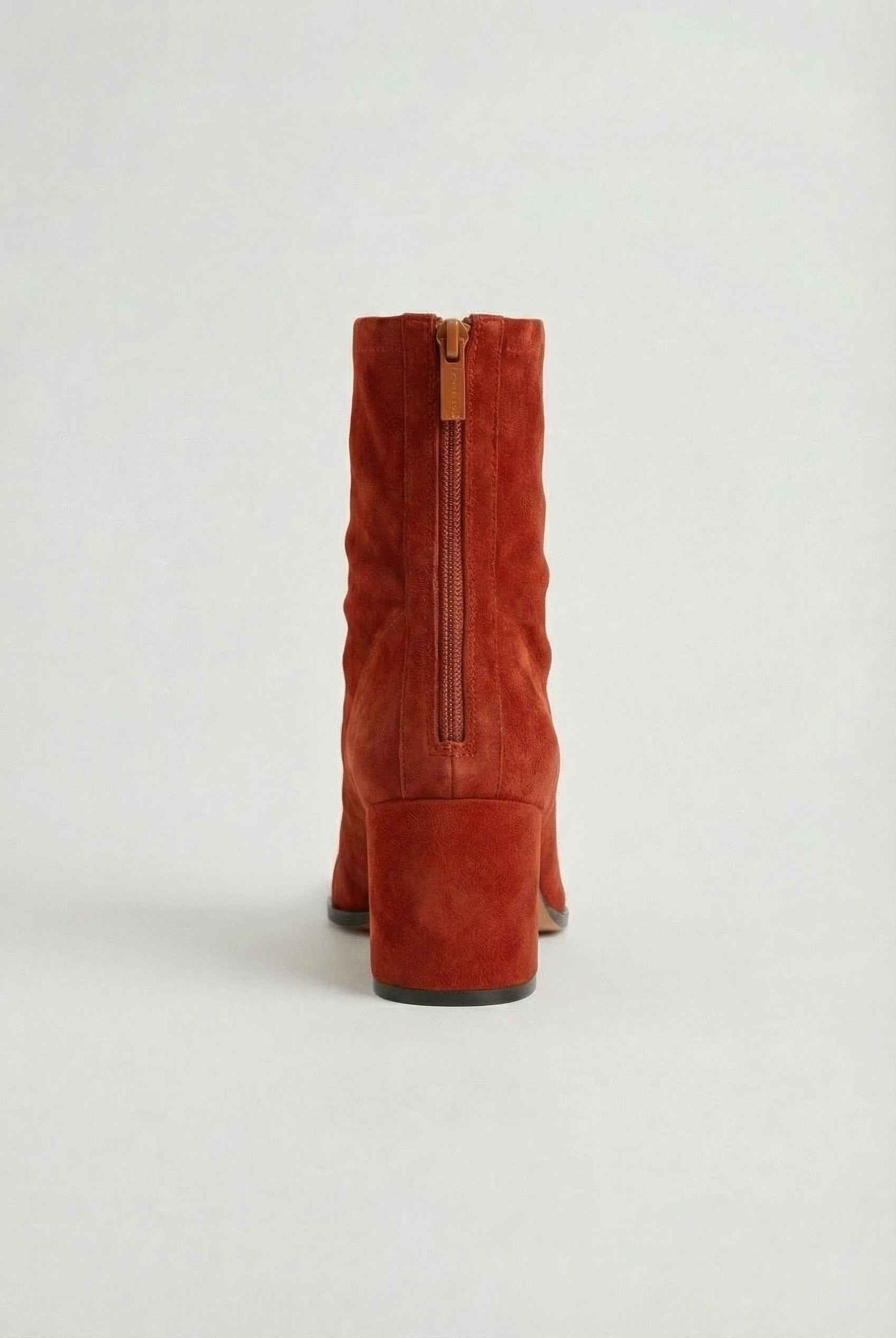 Red Victoria Lumina women's mid-calf boots featuring a chic retro style and bold statement heel.