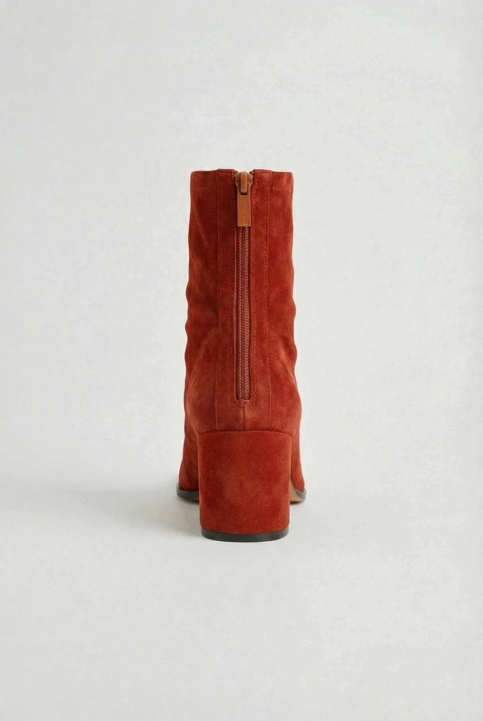 Red Victoria Lumina women's mid-calf boots featuring a chic retro style and bold statement heel.