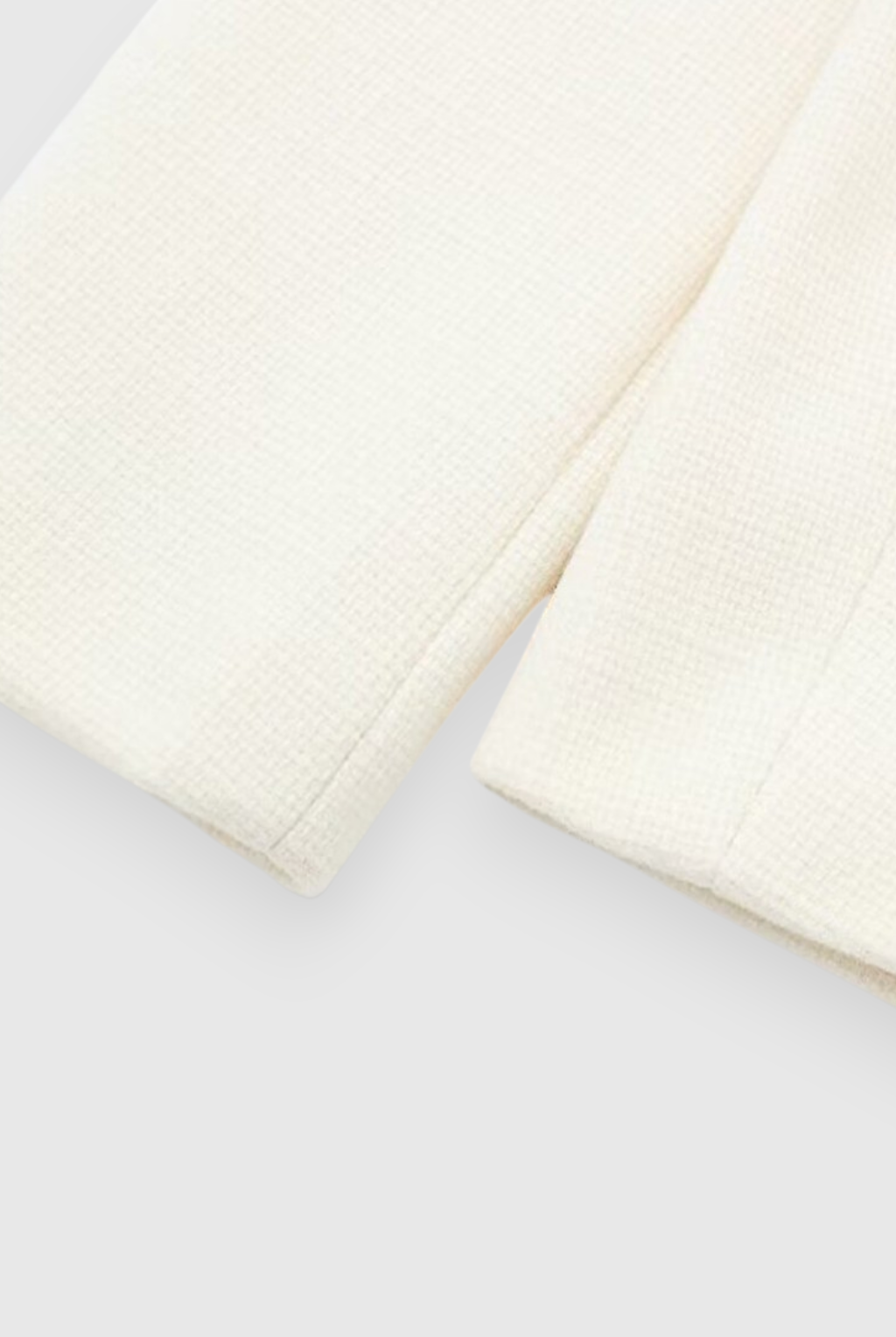 Lumina Wear Victoria white tailored short jacket with versatile style, featuring a chic, fitted design and clean white fabric.