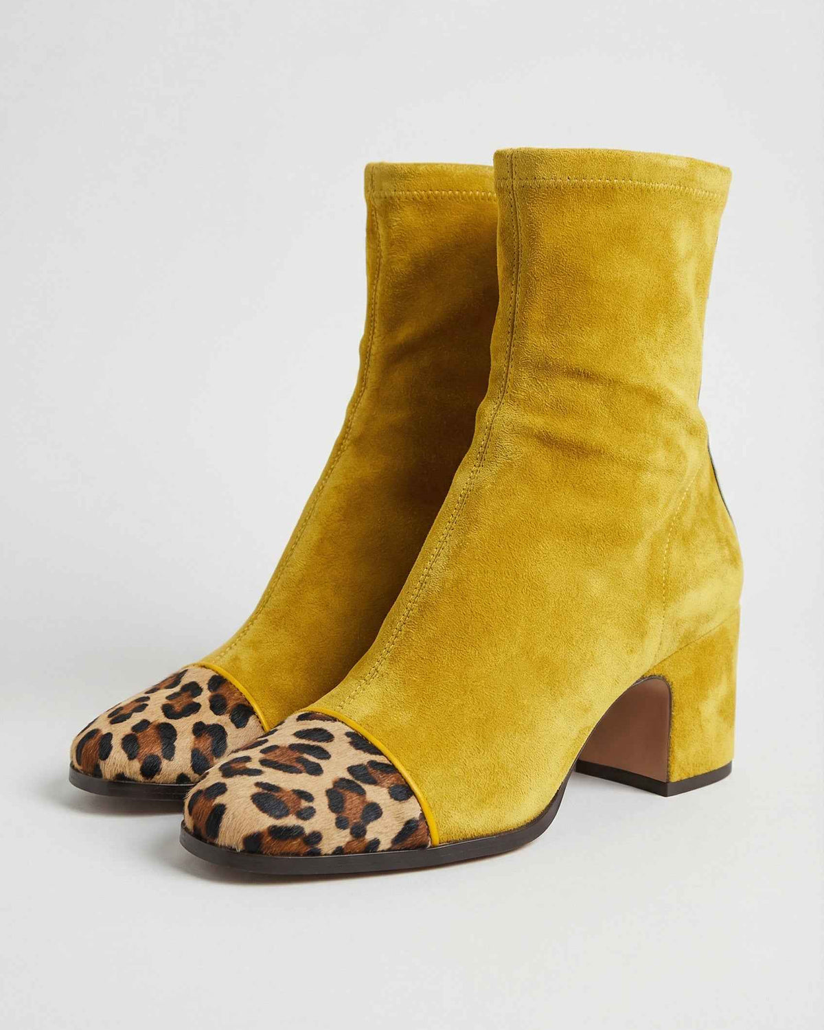 Victoria Lumina yellow mid-calf boots for women with warm lining, stylish footwear designed for comfort and fashion.