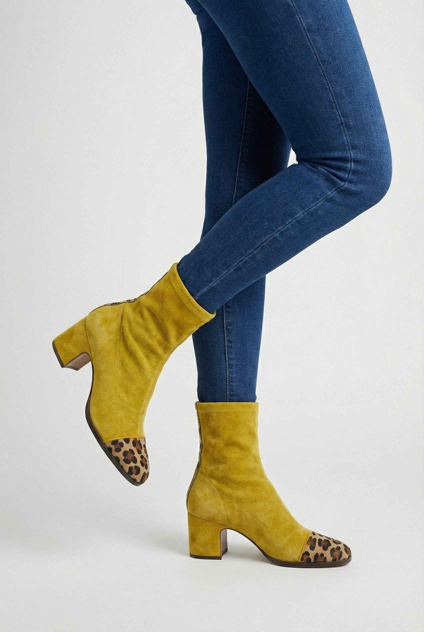 Yellow Lumina Wear Victoria mid-calf women's boots with warm lining, stylish design, and sturdy sole for winter wear.
