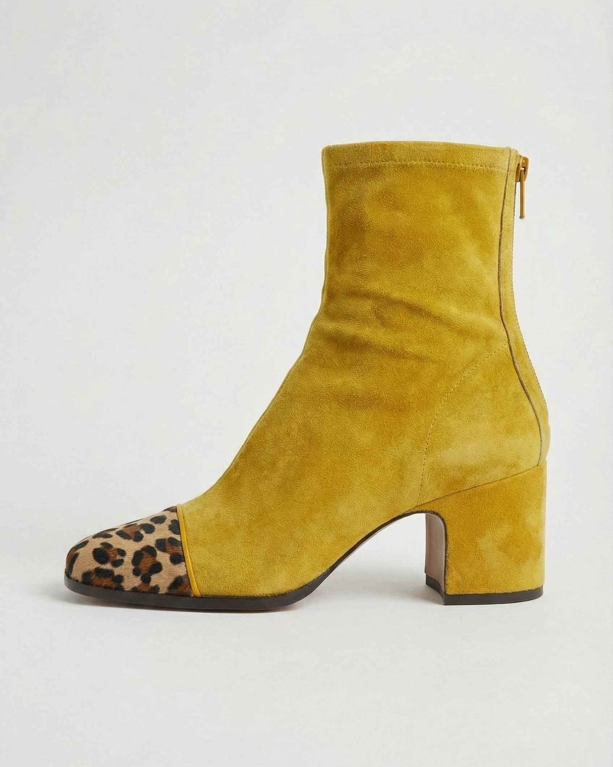 Victoria Lumina yellow mid-calf boots for women with warm lining, stylish chic design, and sturdy sole for winter wear.