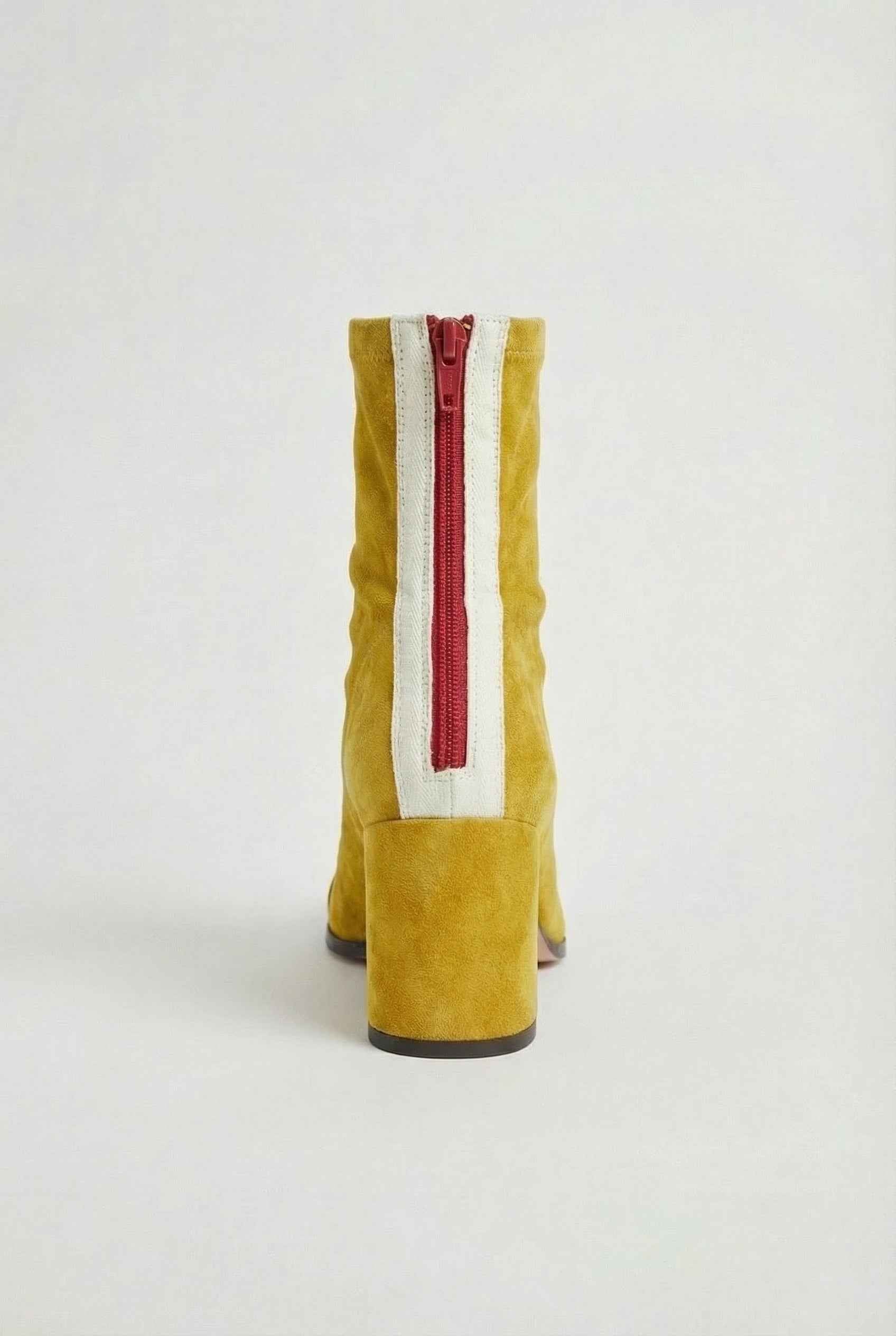 Victoria Lumina yellow mid-calf boots for women with warm lining, stylish footwear with a sleek design and cozy interior.