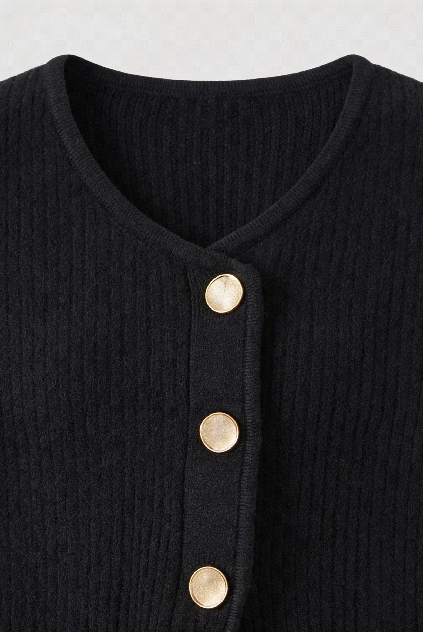 Victoria cozy black knit cardigan by Lumina Wear featuring ribbed details, designed for women's comfort and style.