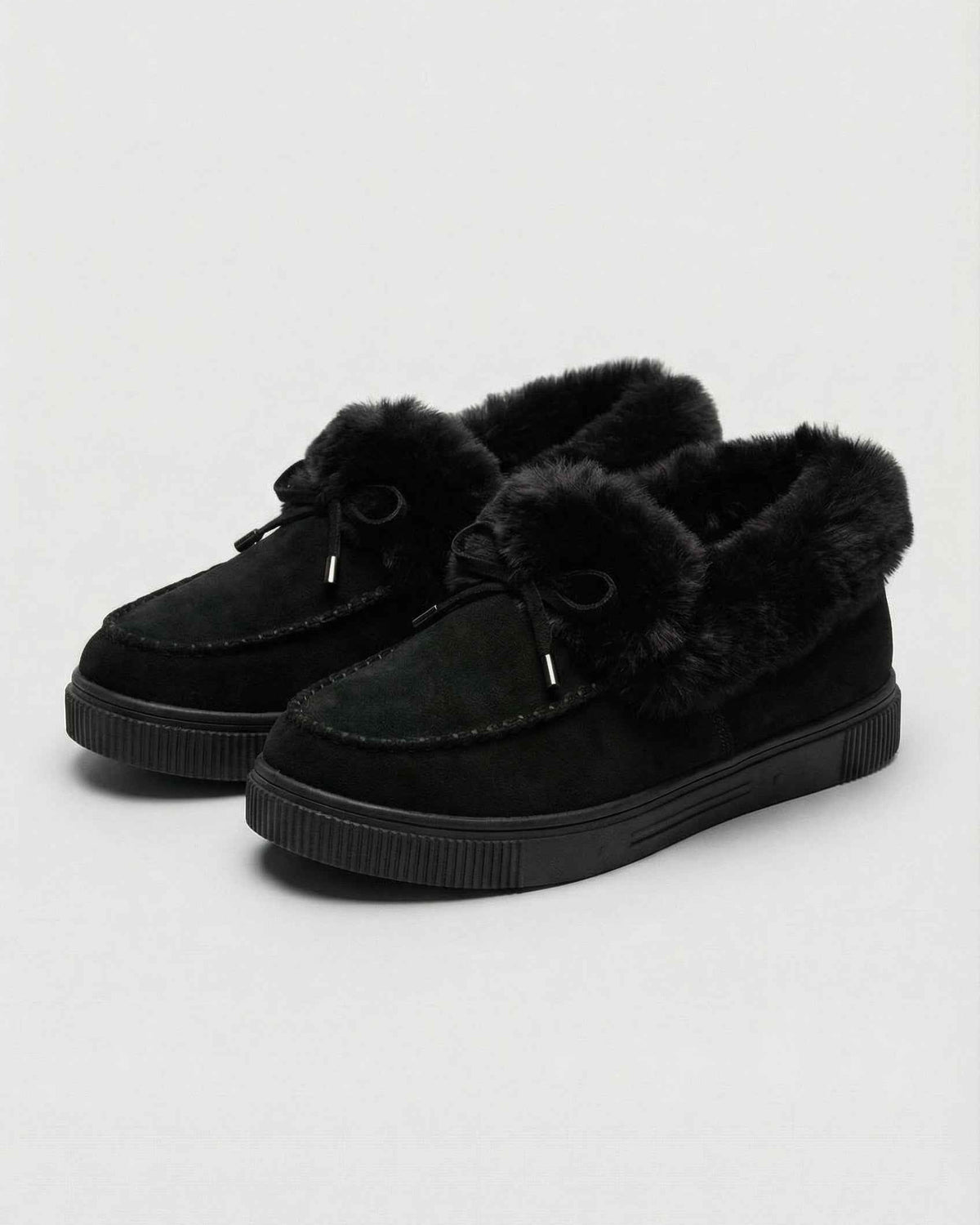 Black Victoria winter boots from Lumina Wear with warm lining, featuring a cozy design and sturdy sole for cold weather comfort.