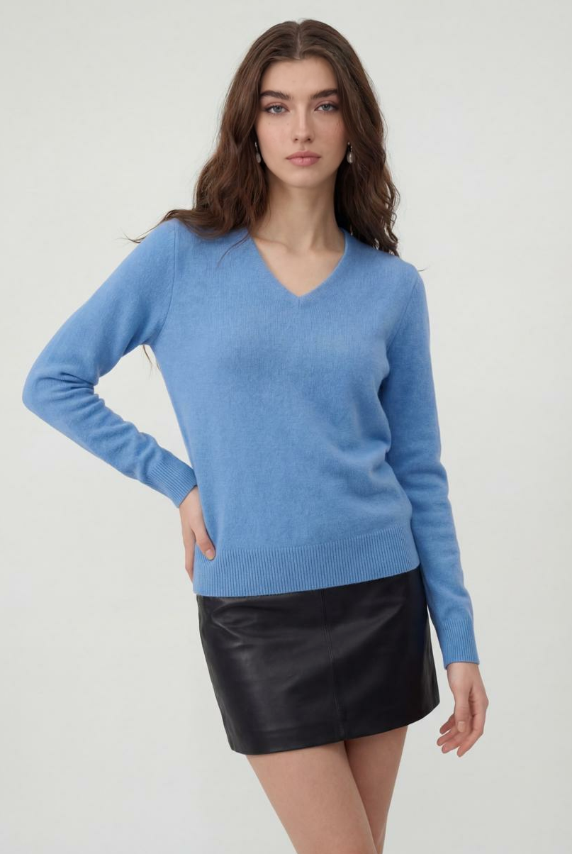 Lumina Wear Victoria cozy blue V-neck women's sweater with flattering fit, soft knit, and stylish design.