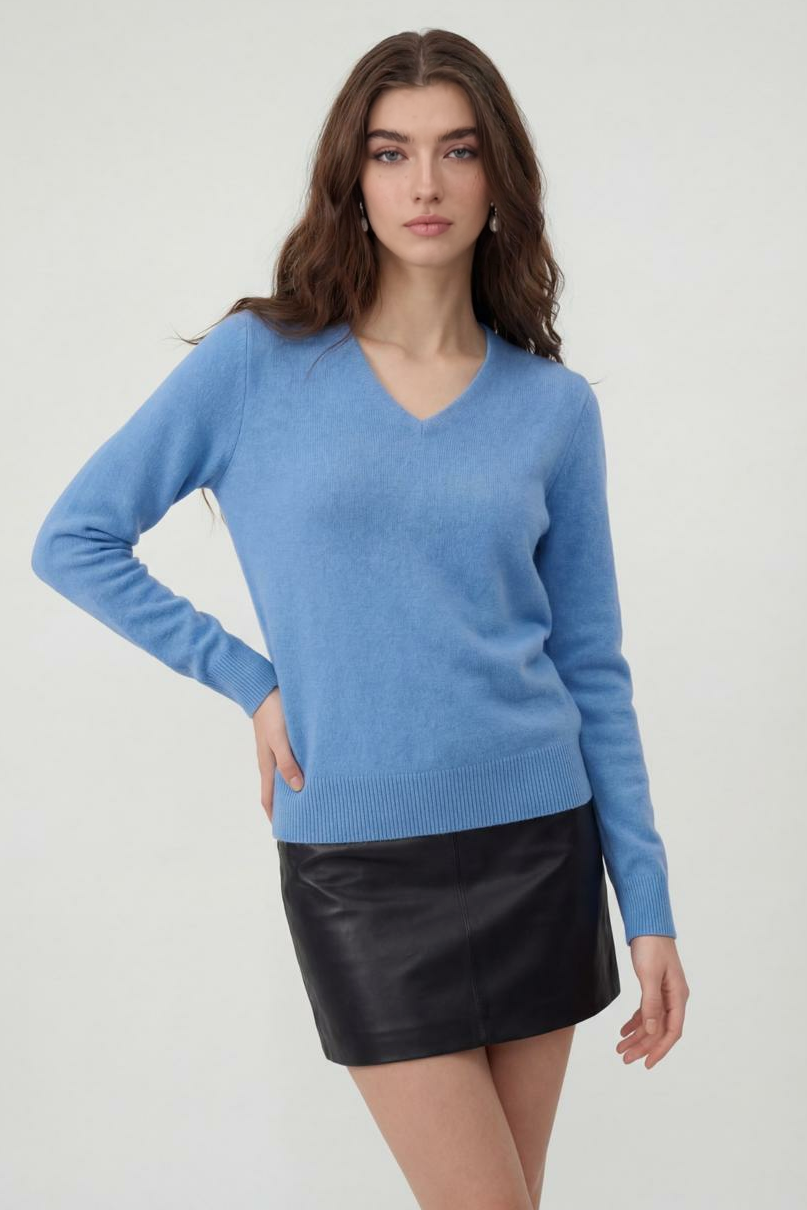 Lumina Wear Victoria cozy blue V-neck women's sweater with flattering fit, soft knit, and stylish design.