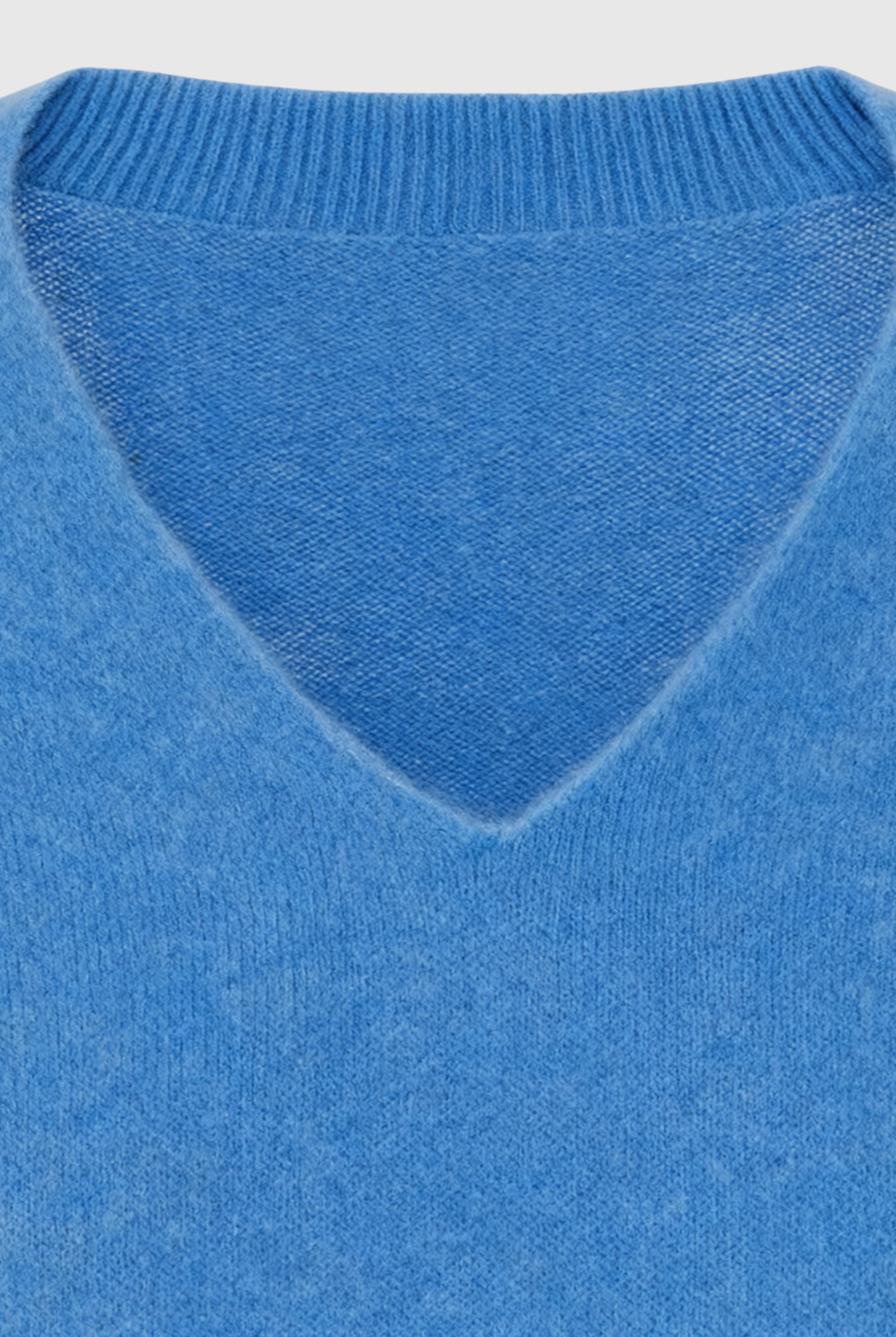 Blue Victoria Lumina Wear women's V-neck sweater with a cozy, flattering fit, perfect for casual and layered looks.