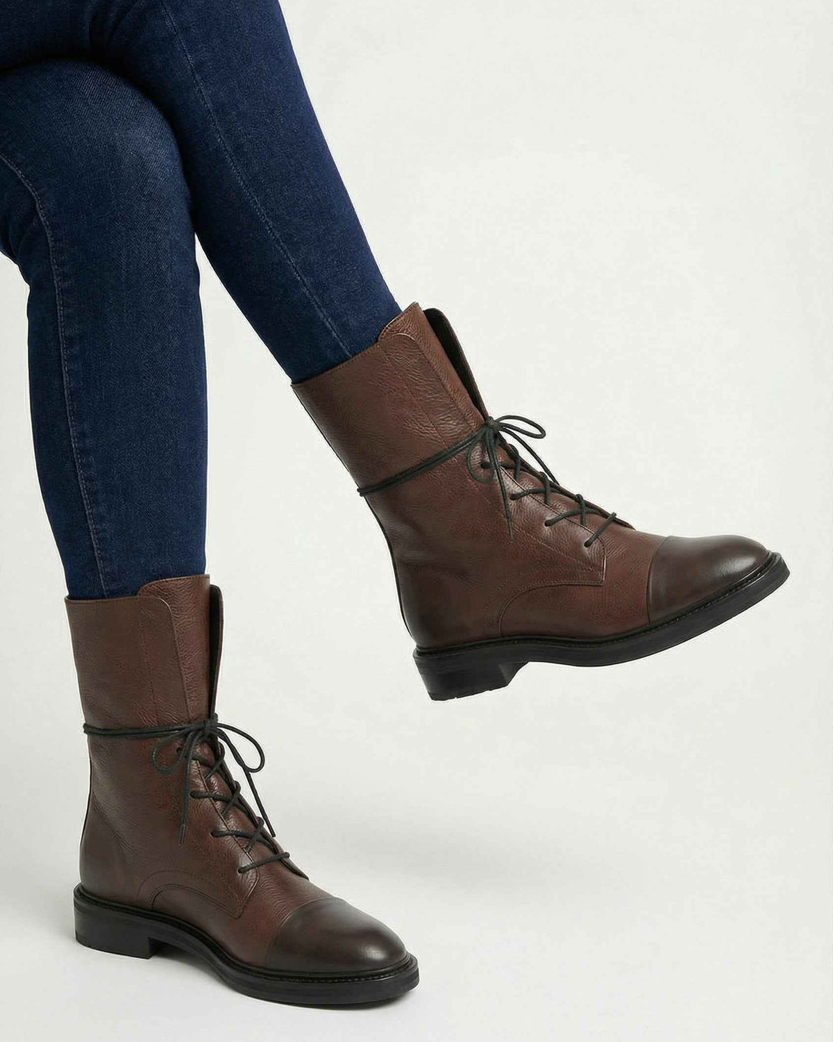 Victoria cozy brown lace-up ankle boots with chic detailing by Lumina Wear, featuring dark brown leather and stylish accents.