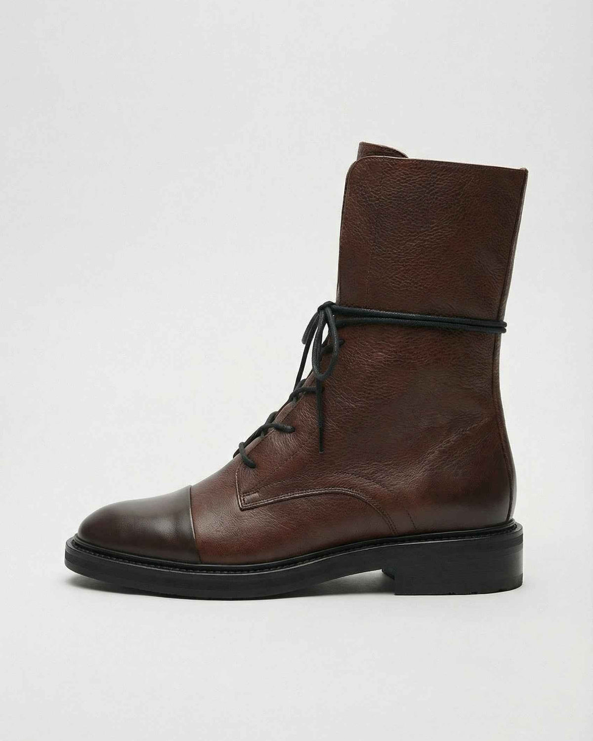 Victoria cozy brown lace-up ankle boots by Lumina Wear featuring chic detailing and dark brown leather with a stylish silhouette.