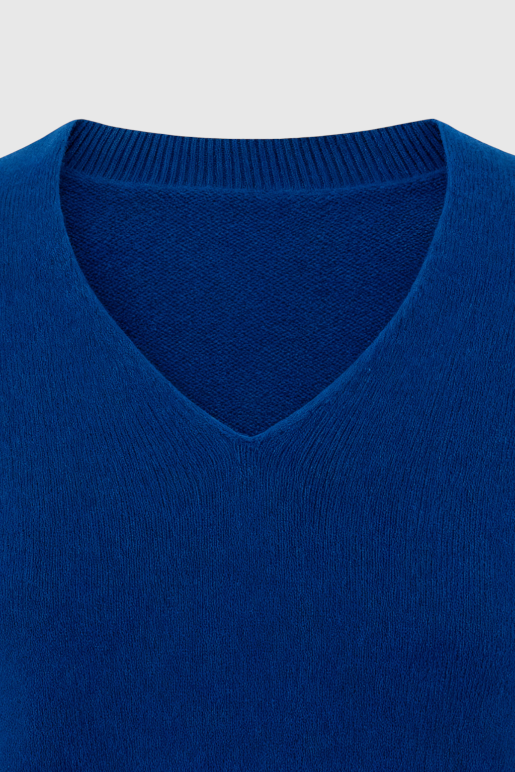 Victoria Lumina dark blue V-neck sweater with a flattering fit, cozy knit, and stylish design, perfect for casual wear.