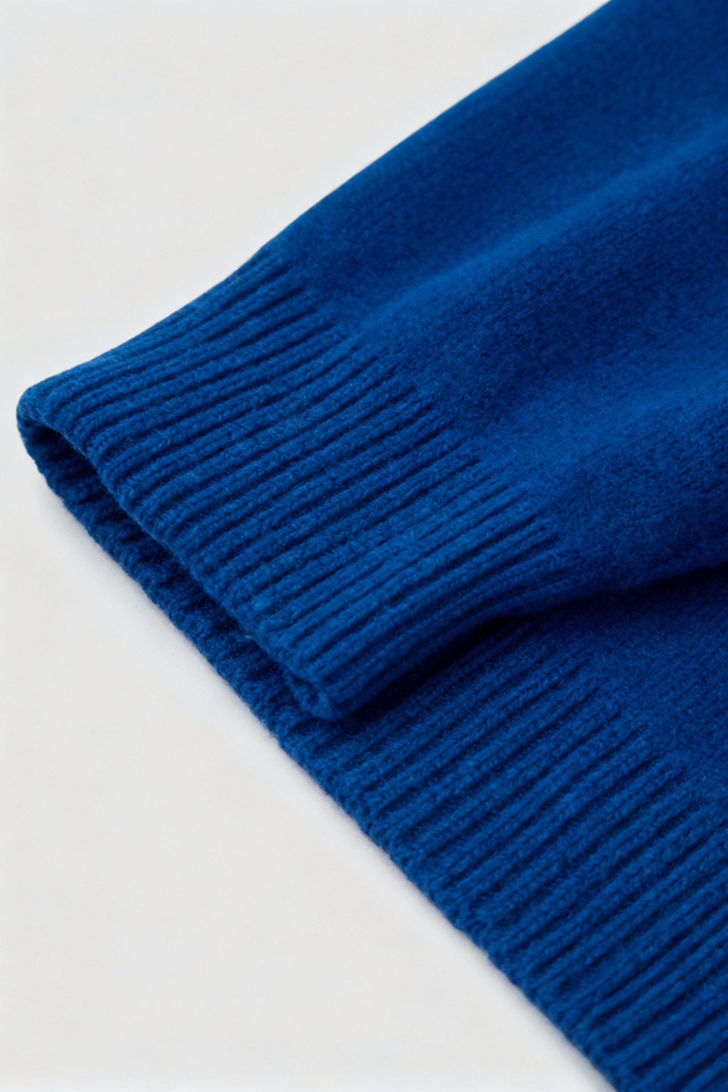 Victoria Lumina dark blue V-neck sweater, cozy fit, stylish and flattering, made by Lumina Wear.