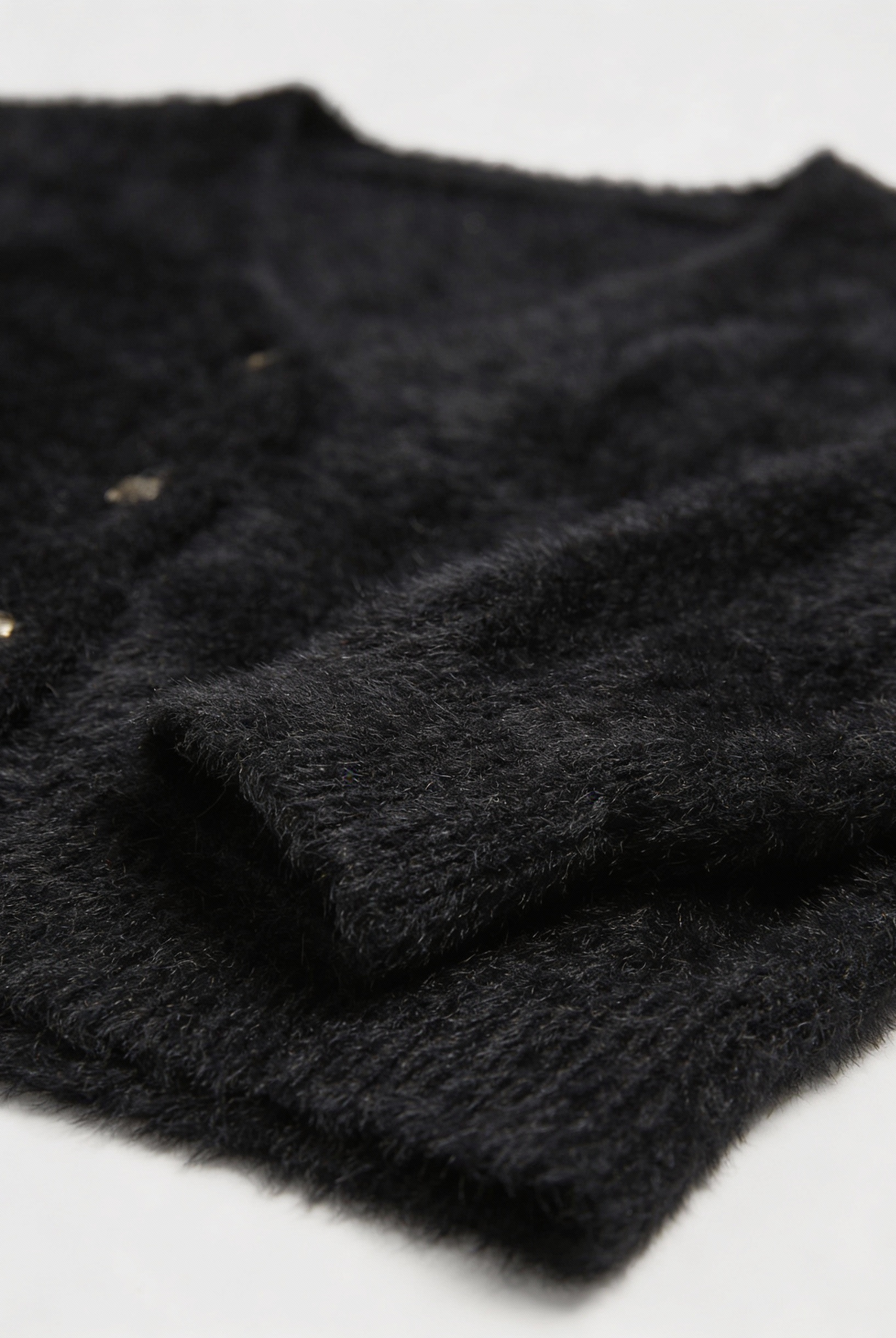 Victoria Lumina cozy long black cardigan sweater with open front design, featuring a relaxed fit and soft knit fabric.