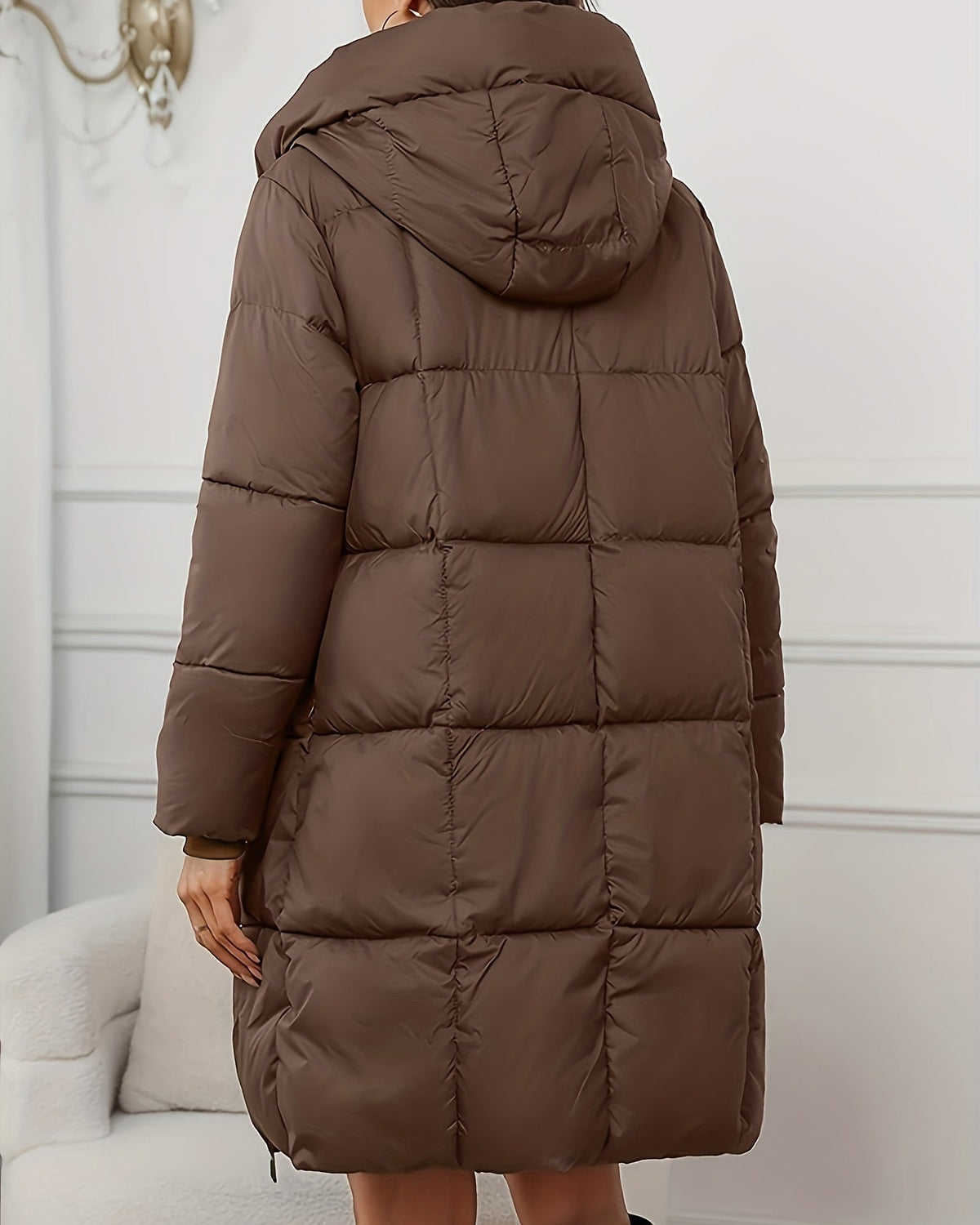 Lumina Wear Victoria longline hooded puffer coat in reddish-brown with practical pockets, cozy and stylish for cold weather.