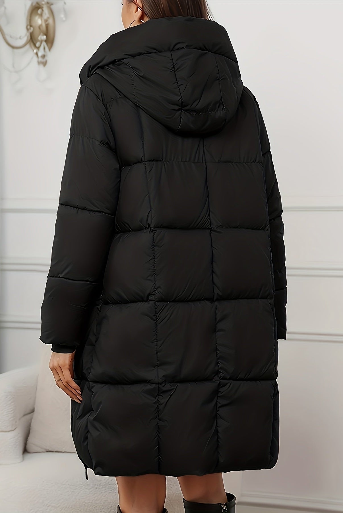 Redish-brown Lumina Wear Victoria cozy longline hooded puffer coat with practical pockets, designed for warmth and comfort.
