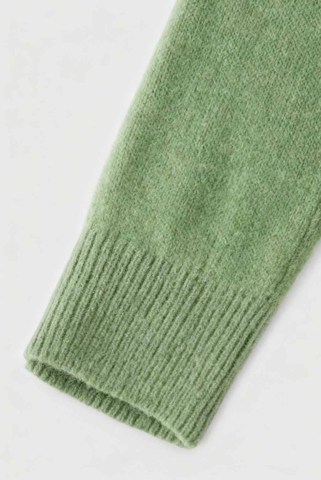 Olive green Lumina Wear Victoria cozy sweater with flattering V-neck, long sleeves, and soft knit fabric for a stylish, comfortable look.