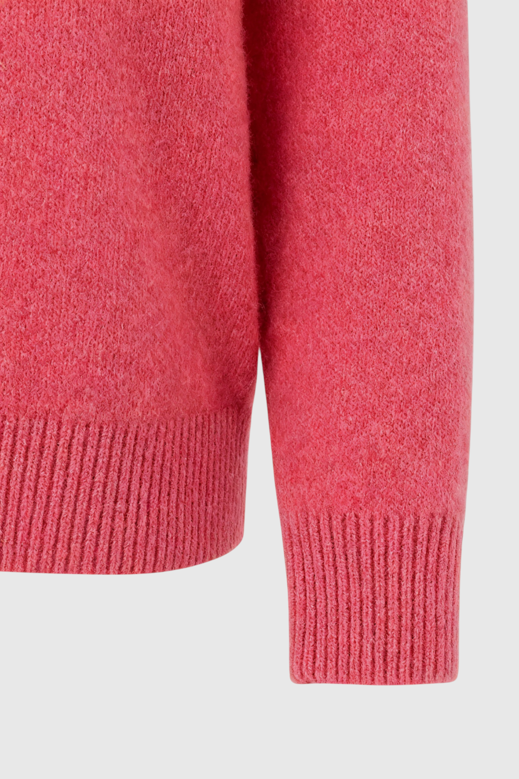 Victoria Lumina pink and red V-neck sweater with a cozy, flattering fit, perfect for casual wear, displayed on a hanger.