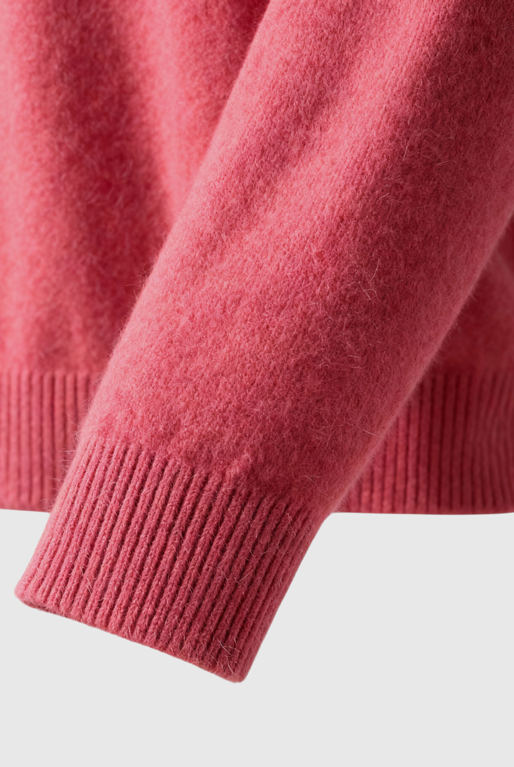 Victoria Lumina pink and red V-neck sweater with a cozy fit, featuring a flattering silhouette and soft knit fabric.