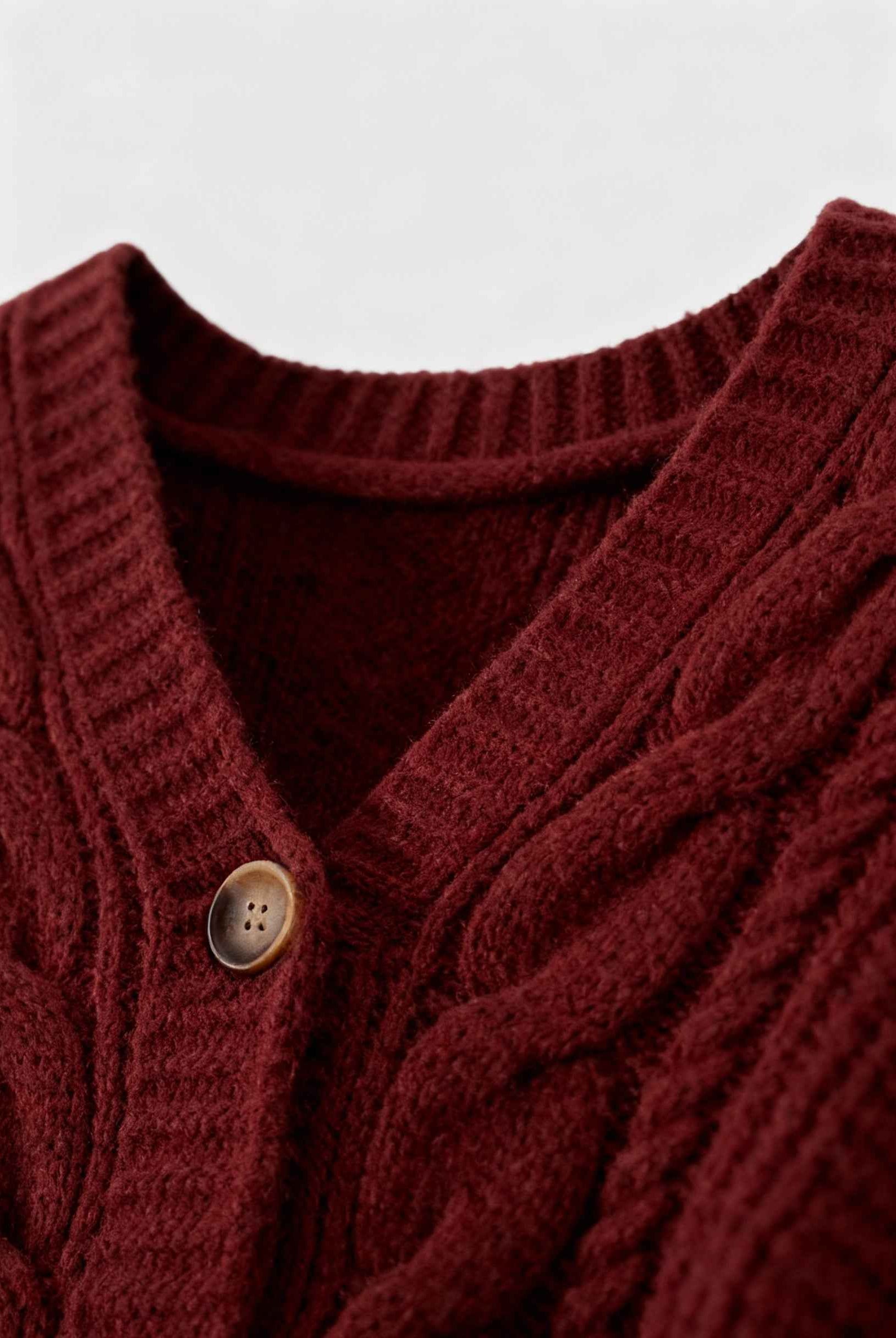 Victoria cozy red long cardigan by Lumina Wear featuring ribbed details, soft knit fabric, and a relaxed fit.