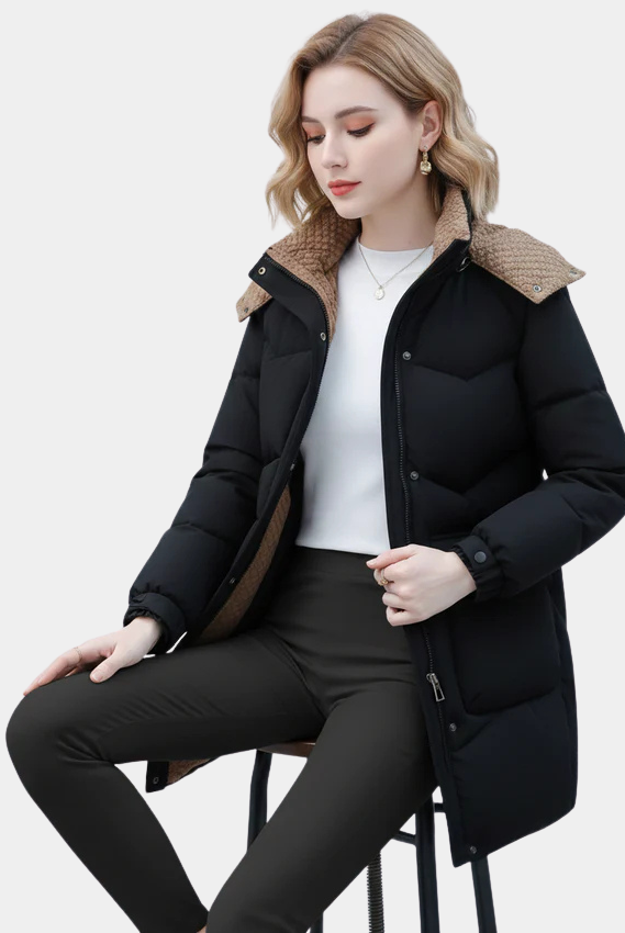 Black Victoria Lumina Wear puffer coat with cozy Sherpa collar and hood, designed for warmth and comfort.
