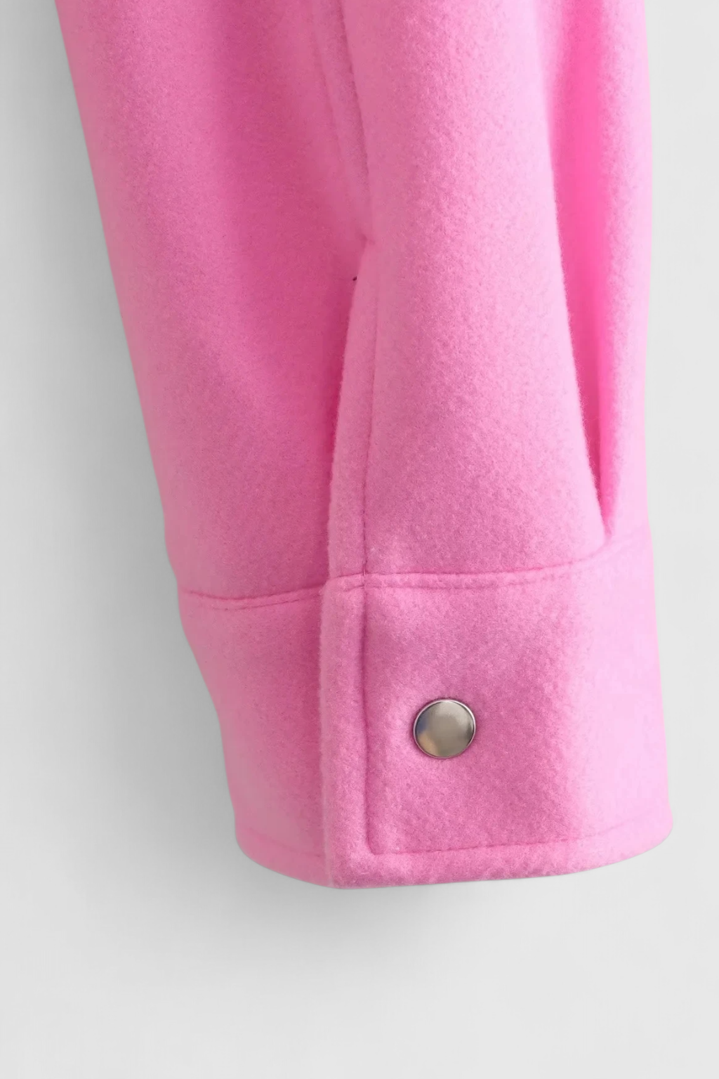 Elegant apricot women's jacket by Lumina Wear featuring classic button closure and tailored fit, perfect for stylish layering.