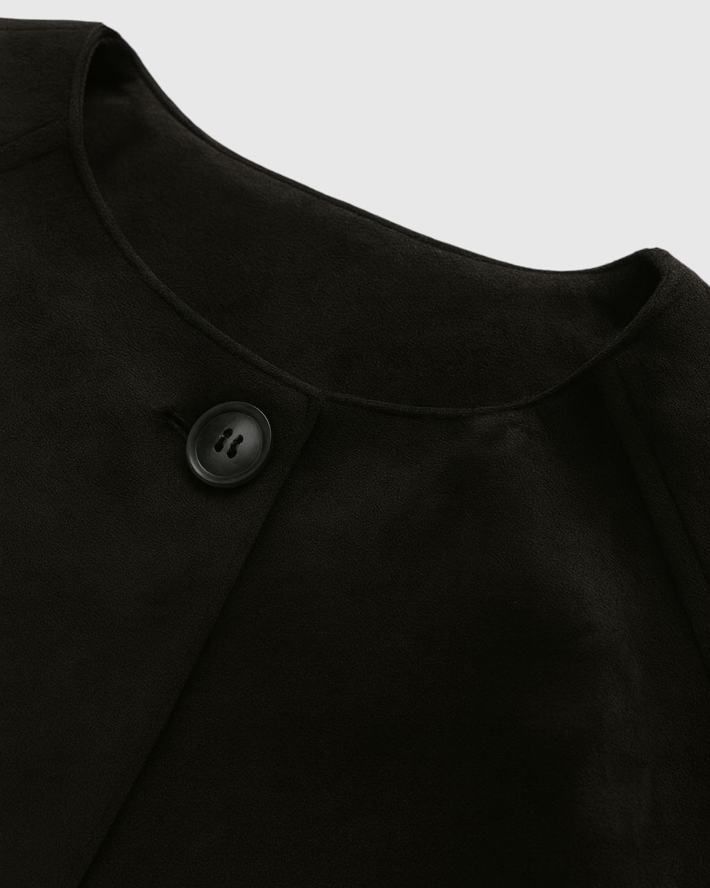 Elegant black Victoria jacket by Lumina Wear featuring a short length, O-neck, and pockets, perfect for stylish women's outerwear.