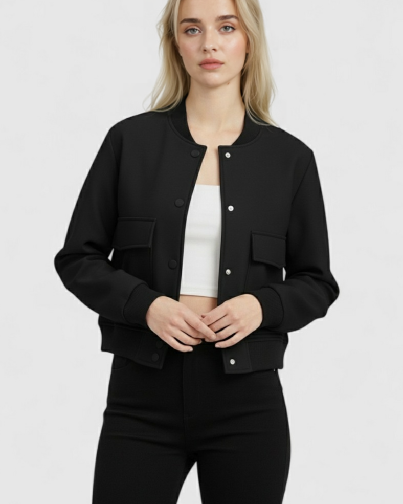 Victoria black bomber jacket by Lumina Wear, featuring a sleek design and modern fit, displayed on a mannequin.