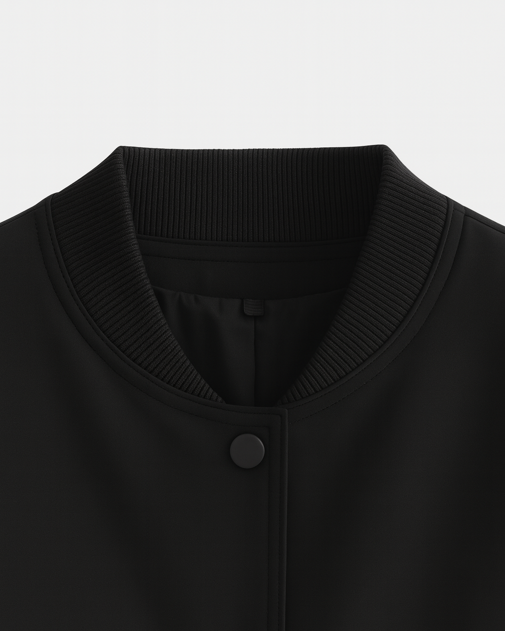 Elegant black bomber jacket by Lumina Wear, featuring a timeless design and sleek fit, shown on a model.