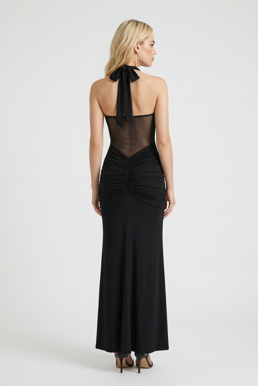 Elegant black halter dress by Lumina Wear featuring a sculpted silhouette, showcased on a model. Perfect for formal occasions.